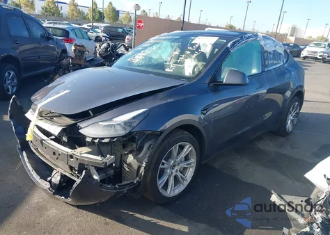 2023 Tesla Model Y Awd/Long Range Dual Motor All-Wheel Drive from USA, damaged, VIN 7SAYGAEE6PF743446
